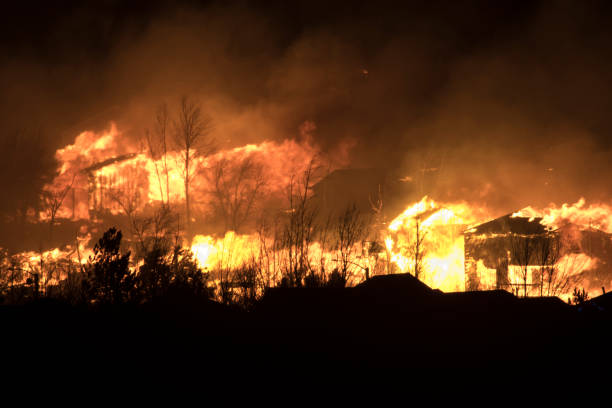 Apocalyptic wild fires burn grasslands Superior homes in Marshall fire outside Boulder Colorado stock photo