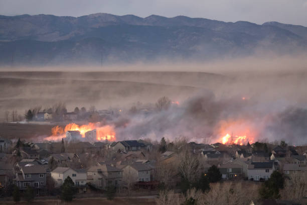High wind driven fires reek havoc on suburban neighborhoods in between Denver and Boulder, Colorado.