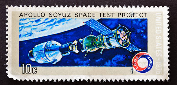 Apollo Soyuz Space Test Project In July 1975, the United States launched the manned Apollo Command, destined to rendezvous with Russia's manned Soyuz module. A special docking station facilitated interaction among the astronauts. This stamp shows the space craft just before hookup. This is the first time two nations colaborated in space, soyuz space mission stock pictures, royalty-free photos & images