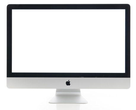 İstanbul, Turkey - July 22, 2014 : Apple iMac 27 inch desktop computer displaying blank white screen on a white background. iMac produced by Apple Inc.