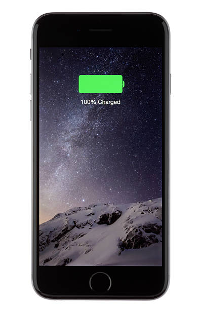 Apple iPhone 6 Fully Charged Colorado Springs, Colorado, USA - January 8, 2015: An Apple iPhone 6 displaying on screen that its battery is 100% fully charged. According to Apple the built-in rechargeable lithium-ion battery in the iPhone 6 has a talk time of up to 14 hours on 3G and internet use of up to 10 hours on 3G and LTE. full photos stock pictures, royalty-free photos & images