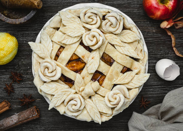 Apple pie with roses stock photo