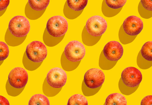 Apples on yellow background seamless Pattern, background, apple - fruit, seamless pattern, yellow apple fruit stock pictures, royalty-free photos & images