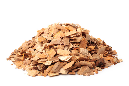 Apple-tree wood chips on white background