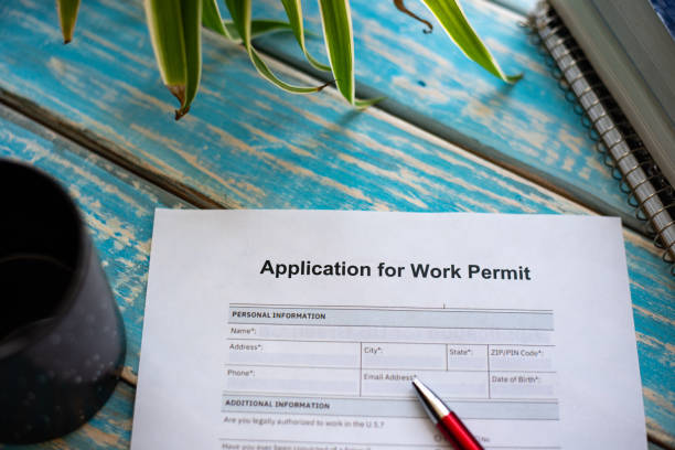 Application for work permit for job abroad stock photo