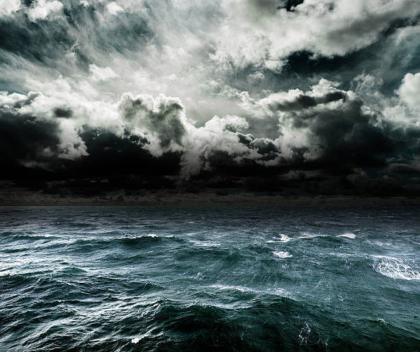 Approaching storm over the ocean. Dangerous storm over ocean. hurricane storm stock pictures, royalty-free photos & images