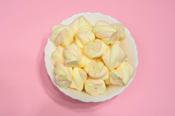 apricot and strawberry marshmallows in white bowl on pink background apricot and strawberry marshmallows in white bowl on pink background diabetic foot stock pictures, royalty-free photos & images
