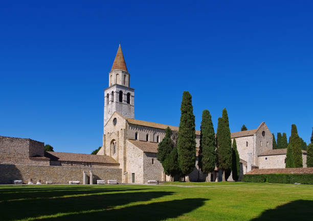 Aquileia Basilica Aquileia, Basilica of Santa Maria Assunta romanesque stock pictures, royalty-free photos & images