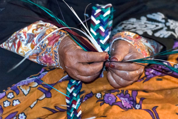 Arab woman weaving stock photo