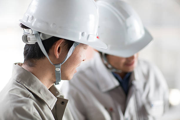 Architect and engineer at a building site stock photo