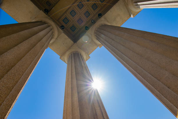 Architectural Columns and Sunlight stock photo