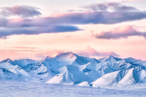 Arctic mountain sunrise stock photo
