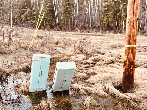 The fast thawing Arctic permafrost due to global warming caused distortion of electricity boxes placed close by a highway in Fairbanks Alaska.