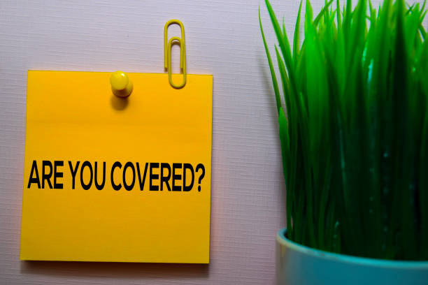 Are You Covered? text on sticky notes isolated on office desk stock photo