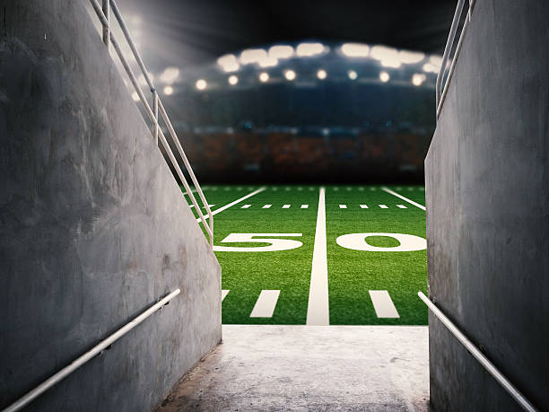 arena tunnel 3d rendering arena tunnel with american football field american football field stadium stock pictures, royalty-free photos & images