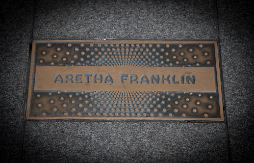 New York City, United States - September 3, 2014: Aretha Franklin paving slab in front of famous Apollo theatre in Harlem New York City