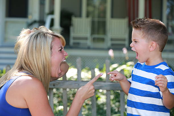 Arguing mother and son stock photo