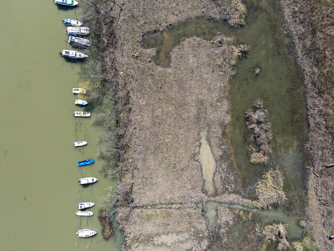 Arial view of river boats at spring day. Preparation of boats for fishing. From the river Tamis, Pancevo Serbia.