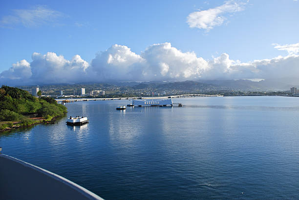 USS Arizona Memorial A View of the USS Arizona Memorial from the Bow of the USS Missouri pearl harbor stock pictures, royalty-free photos & images