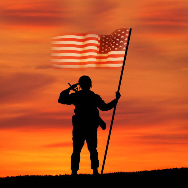 USA army soldier with nation flag. Greeting card for Veterans Day , Memorial Day, Independence Day . America celebration. USA army soldier with nation flag. Greeting card for Veterans Day , Memorial Day, Independence Day . America celebration. memorial day stock pictures, royalty-free photos & images