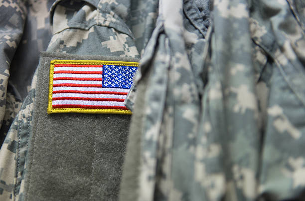 U.S. army uniform An american flag on the shoulder of the army clothing military uniform stock pictures, royalty-free photos & images