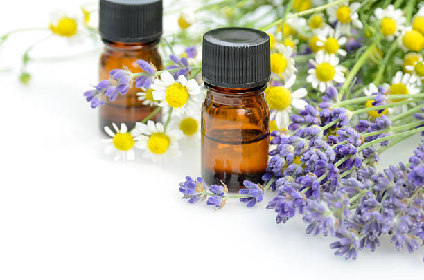 aromatherapy treatment with chamomile and lavender stock photo