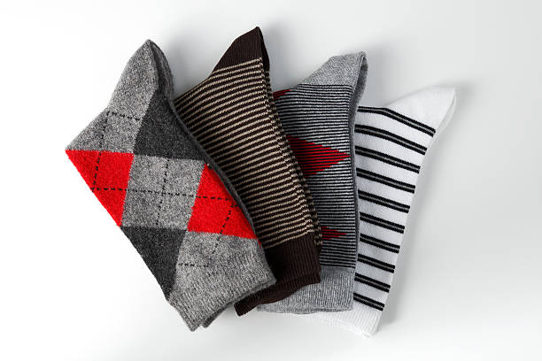 arrangement of folded socks stock photo