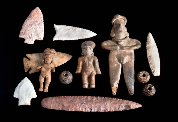 Arrowheads and Pre Columbian Antiques. Real Pre Columbian figures,spindle whorls and arrowheads. antiquities stock pictures, royalty-free photos & images