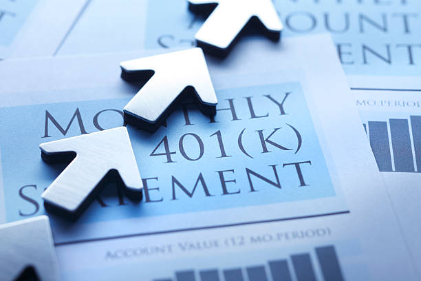 Arrows Pointing In Positive Direction On 401k Statement A row of arrows sitting on top of a 401k statement indicate the positive growth in the value of the retirement account. A cool blue cast dominates the scene. 401k stock pictures, royalty-free photos & images