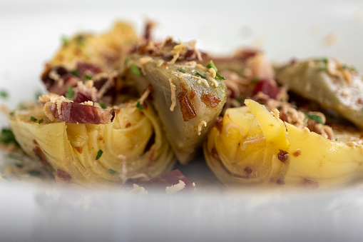Artichokes with ham, refried garlic and foie shavings in Ortuella, Basque Country, Spain