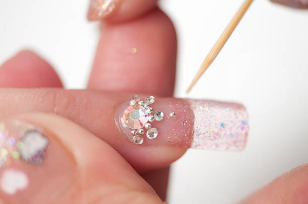 Artificial Nails - Faulse Diamond Decoration Artificial Nails - Faulse Diamond Decoration artificial nail stock pictures, royalty-free photos & images