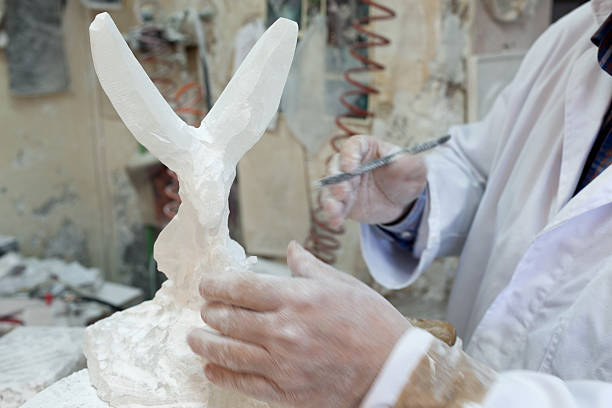 Artist Sculpting Alabaster, Volterra, Italy stock photo
