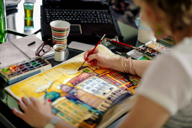 https://media.istockphoto.com/photos/artist-working-at-home-picture-id689026168?k=6&m=689026168&s=612x612&w=0&h=AbKHyjRFiGQnyJ7y6mVNmsAEqjhEUAfd6T6jx3kBaA0=