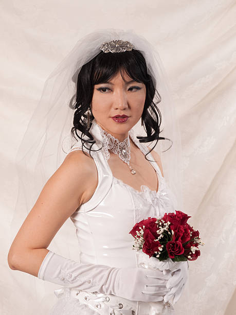 PVC Asian Bride - askance look stock photo