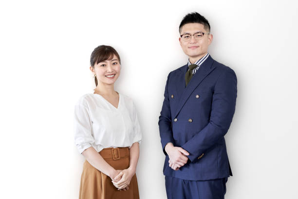 笑顔で立つアジアのビジネスパーソン - インタビュー　日本人 ストックフォトと画像