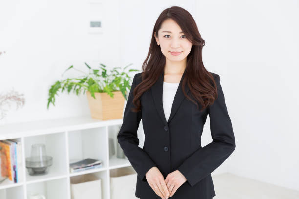 アジアのビジネスウーマン - オフィス　スーツ ストックフォトと画像