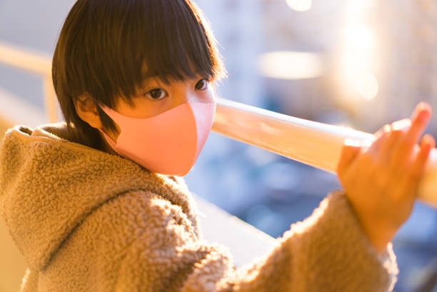 Asian child wearing a mask. stock photo