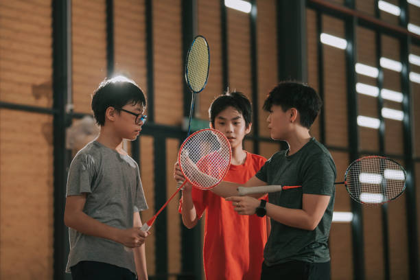 Asian children playing badminton