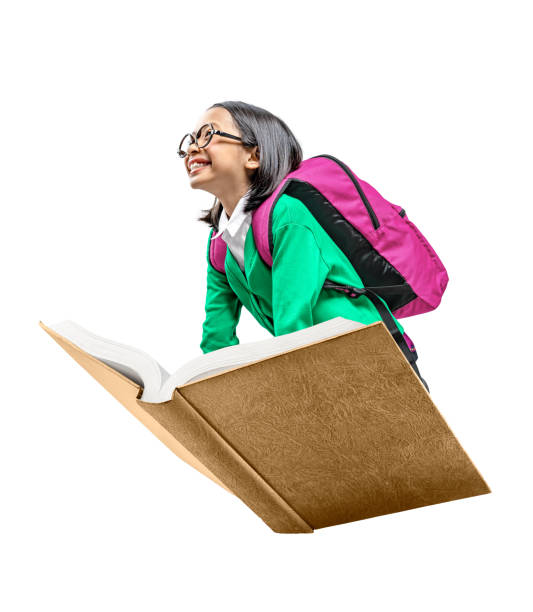 Asian cute girl with glasses and backpack sitting on the book Asian cute girl with glasses and backpack sitting on the book isolated over white background philippines girl stock pictures, royalty-free photos & images
