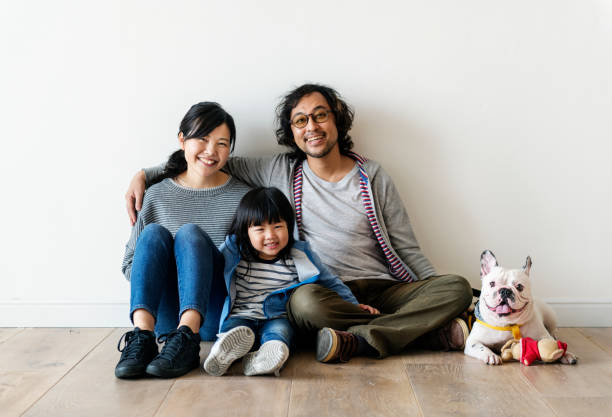 Asian family buy new house Asian family buy new house relocation photos stock pictures, royalty-free photos & images
