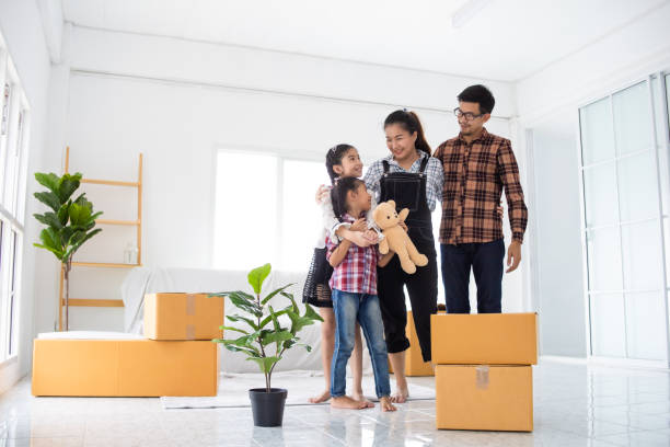 Asian family in new home stock photo