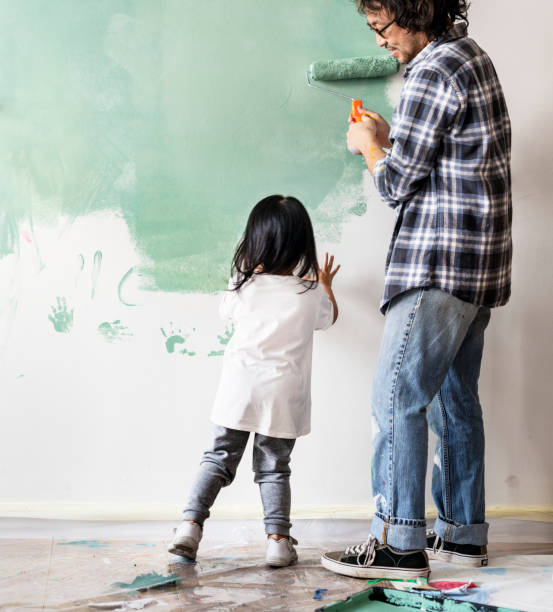Asian family renovating the house Asian family renovating the house child korea little girls korean ethnicity stock pictures, royalty-free photos & images