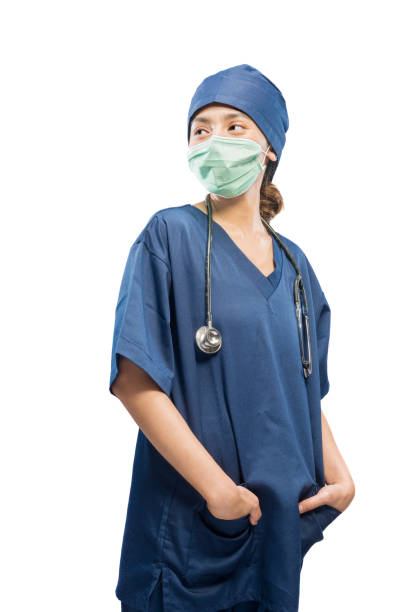 Asian female nurse with face mask and stethoscope stock photo