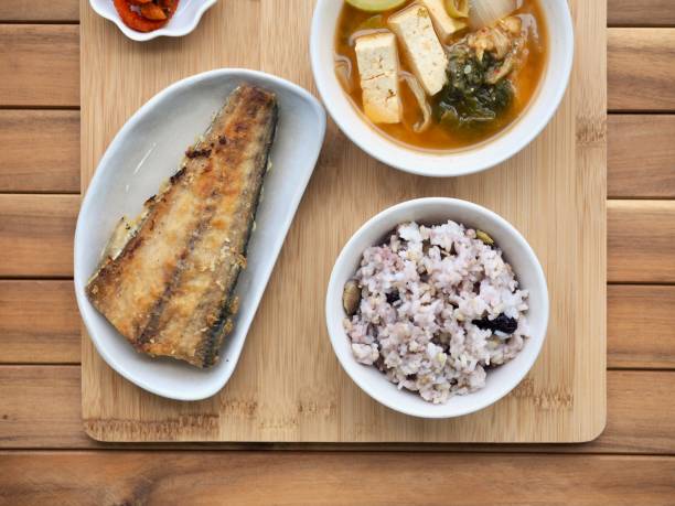 Asian food grilled fish, rice, miso soup Shot in studio afforestation stock pictures, royalty-free photos & images