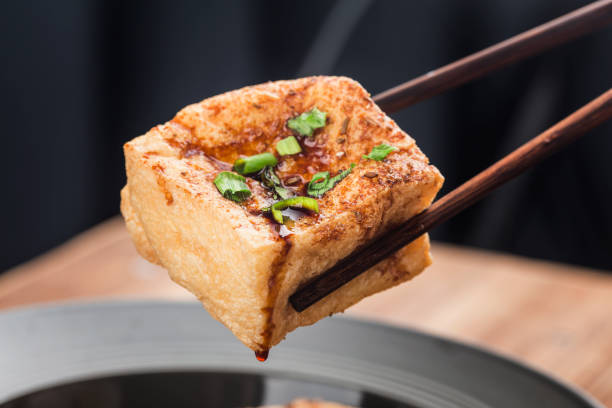 Asian food grilled tofu and soy sauce stock photo