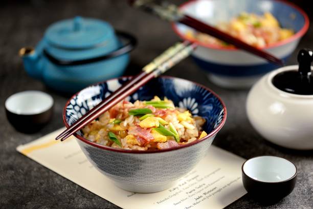 Asian fried rice with bacon and egg. stock photo