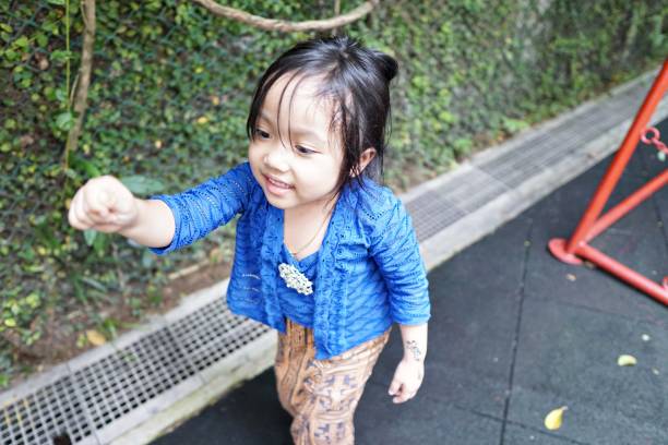 Asian girl wearing Malay traditional attire stock photo