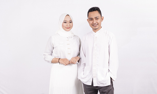 Asian moslem couple wearing moslem clothes