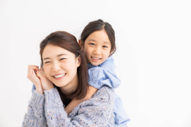 アジアの母と娘 - 児童 ストックフォトと画像