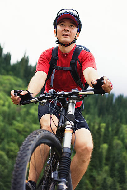 Asian mountain biker stock photo